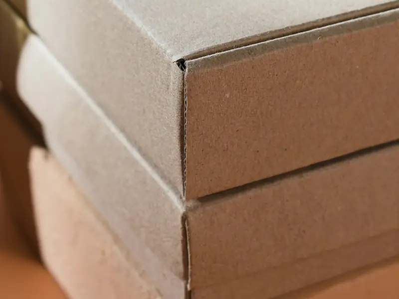 Stacked kraft mailer boxes