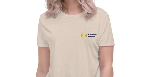 Heather crop tee with a small sun print on the chest