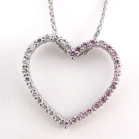 Open heart pendant set with clear and pink stones on a silver chain