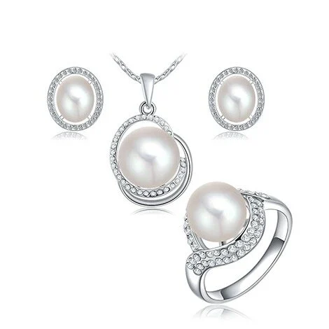 Pearl pendant, pearl ring and pearl stud earrings set in silver