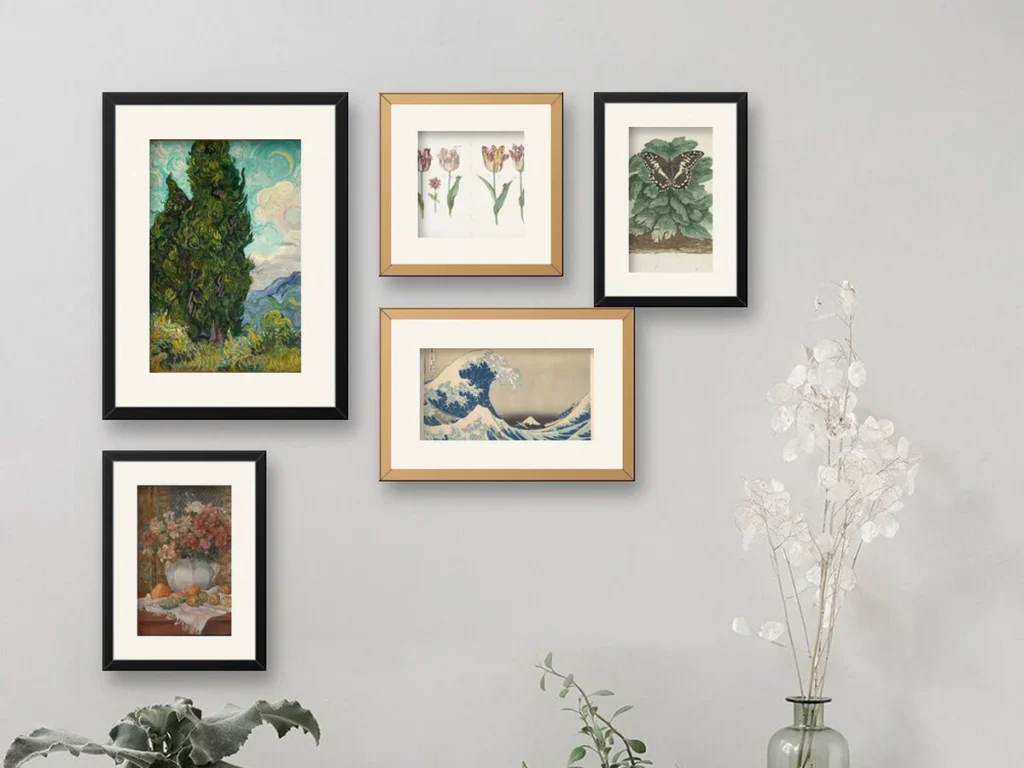 A gallery wall of five framed prints