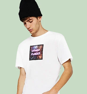 Young man in a white tee with a square graphic print