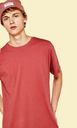 Young man in a red beanie and a plain red tee