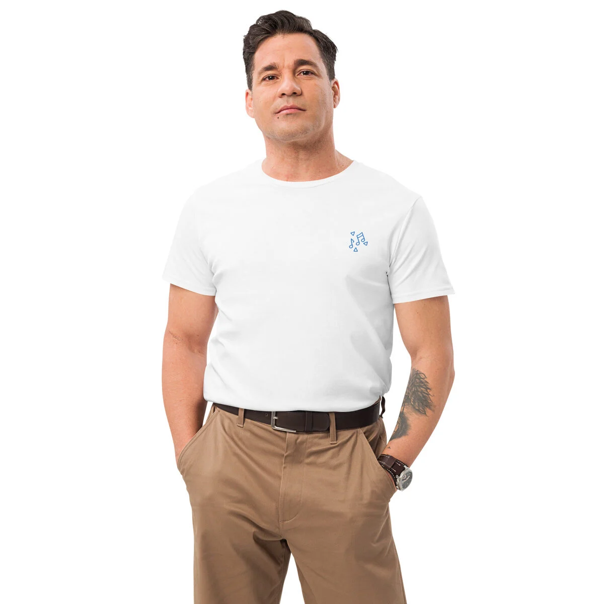 Man in a white premium tee with a small embroidered note