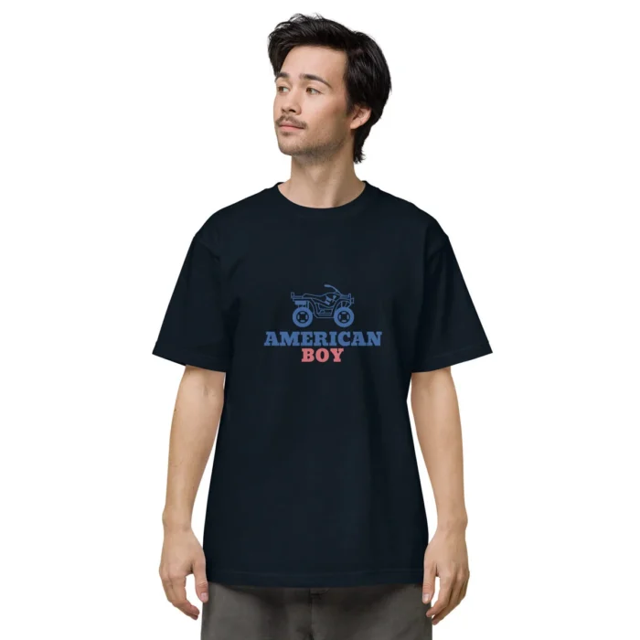Man in a navy tee with a blue and red truck graphic