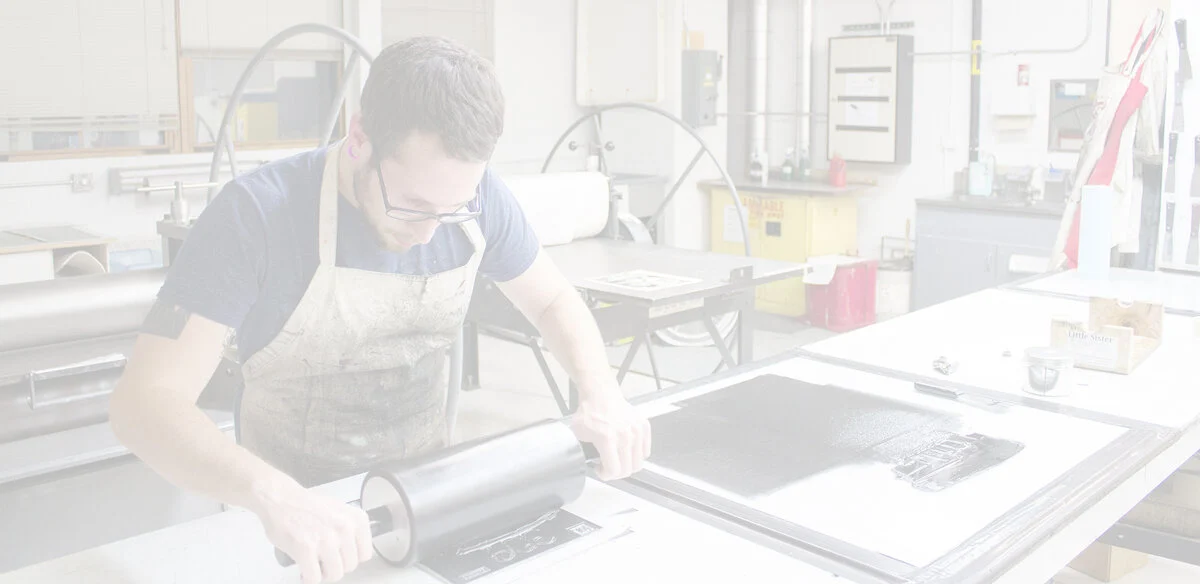 A printer at work in the PrintShop workshop