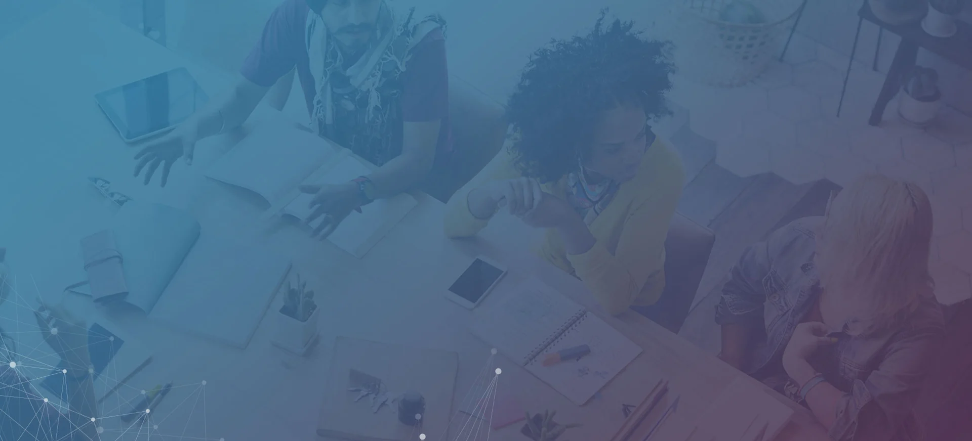 Team planning a print campaign at a table
